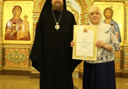 Вечернее богослужение в Богоявлениском храме в день престольного праздника. Награждение