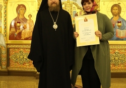 Вечернее богослужение в Богоявлениском храме в день престольного праздника. Награждение