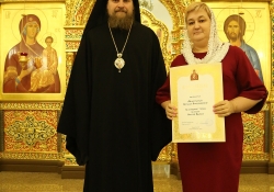 Вечернее богослужение в Богоявлениском храме в день престольного праздника. Награждение