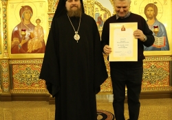 Вечернее богослужение в Богоявлениском храме в день престольного праздника. Награждение
