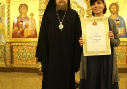 Вечернее богослужение в Богоявлениском храме в день престольного праздника. Награждение